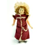 French Petitcollin Celluloid Doll. 13". Marked on the back of her neck, symbol of Eagle wing,