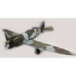 An impressive large scale Radio Controlled Model Aircraft - Spitfire - approx 1/4 to 1/8 scale.