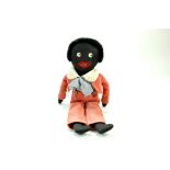 Vintage 18” Black clothed Golly doll. Embroidered mouth button eyes wearing Salmon coloured jacket/