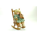 Alberon Porcelain Doll. Girl Sitting in Rocking Chair. Boxed and Complete. Excellent. Note: We are