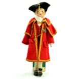 An appealing and unusual 15” Antique German Peg Doll. Original Mayors costume; Red robe, hat,