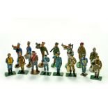 A group of metal military figures comprising more recent issues plus harder to find marching buglers