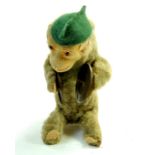 Marx 1950's 7" Wind Up Monkey Chimp playing Cymbals. Brass cymbals, Peach felt hands, feet, ears.