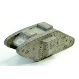 A large and vintage model of a British World War One Mark V Battle Tank. Metal Cast. Maker