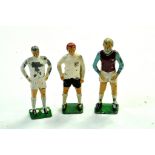 Keymen Football Series figures comprising Bobby Moore, Alan Ball and one other. Generally fair to