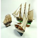 An impressive trio of model ships. Two mounted on plinths. Well made examples. Note: We are happy to