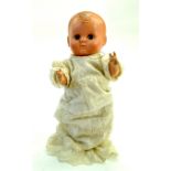 11” early 1950s First Face Rosebud Hard Plastic Doll. Marked Rosebud Made in England on neck and