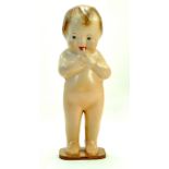 A Large 13” Nude Child doll sucking finger. Minor Kewpie resemblance. No Markings. Bisque, painted