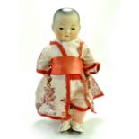 A beautiful 12” circa 1920 Gernab Bisque Asian Baby Boy Doll. Markings Armand Marseille A six