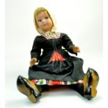 A large refined Dutch Doll, dressed beautifully and with wondeful clog footwear. Generally very