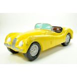 Large Composite Model of a Jaguar XK120 Yellow Sports Car from an Old Toy Shop, previously used as