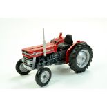 Universal Hobbies 1/16 diecast farm issue comprising Massey Ferguson 135 Tractor. A little dusty but