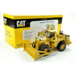 Norscot 1/50 diecast construction issue comprising CAT 854G Wheel Dozer. Excellent with original