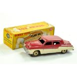 Dinky No. 172 Studebaker Land Cruiser in two tone crimson cream with fawn ridged hubs. Generally