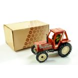 Britains 1/32 farm issue comprising Hesston 880DT Tractor (Genuine). Excellent in incorrect box.