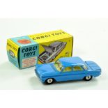 Corgi No. 229 Chevrolet Corvair in Mid Blue, cream interior. Spun Hubs. Generally very good in a
