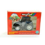 Britains 1/32 farm issue comprising New Holland 6635 Tractor. Excellent in very good box. Enhanced