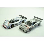 A duo of Maisto 1/18 diecast racing cars. Generally Good, albeit not checked for absolute