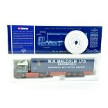 Corgi 1/50 diecast truck issue comprising No. 75806 MAN Curtainside in the livery of WH Malcolm.