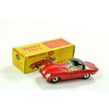 Dinky No. 120 Jaguar E Type in red with black roof, spun hubs. Cream interior. Nice example is
