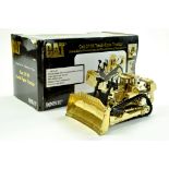 Norscot 1/50 diecast construction issue comprising CAT D11R Track Type Tractor in Gold Livery.