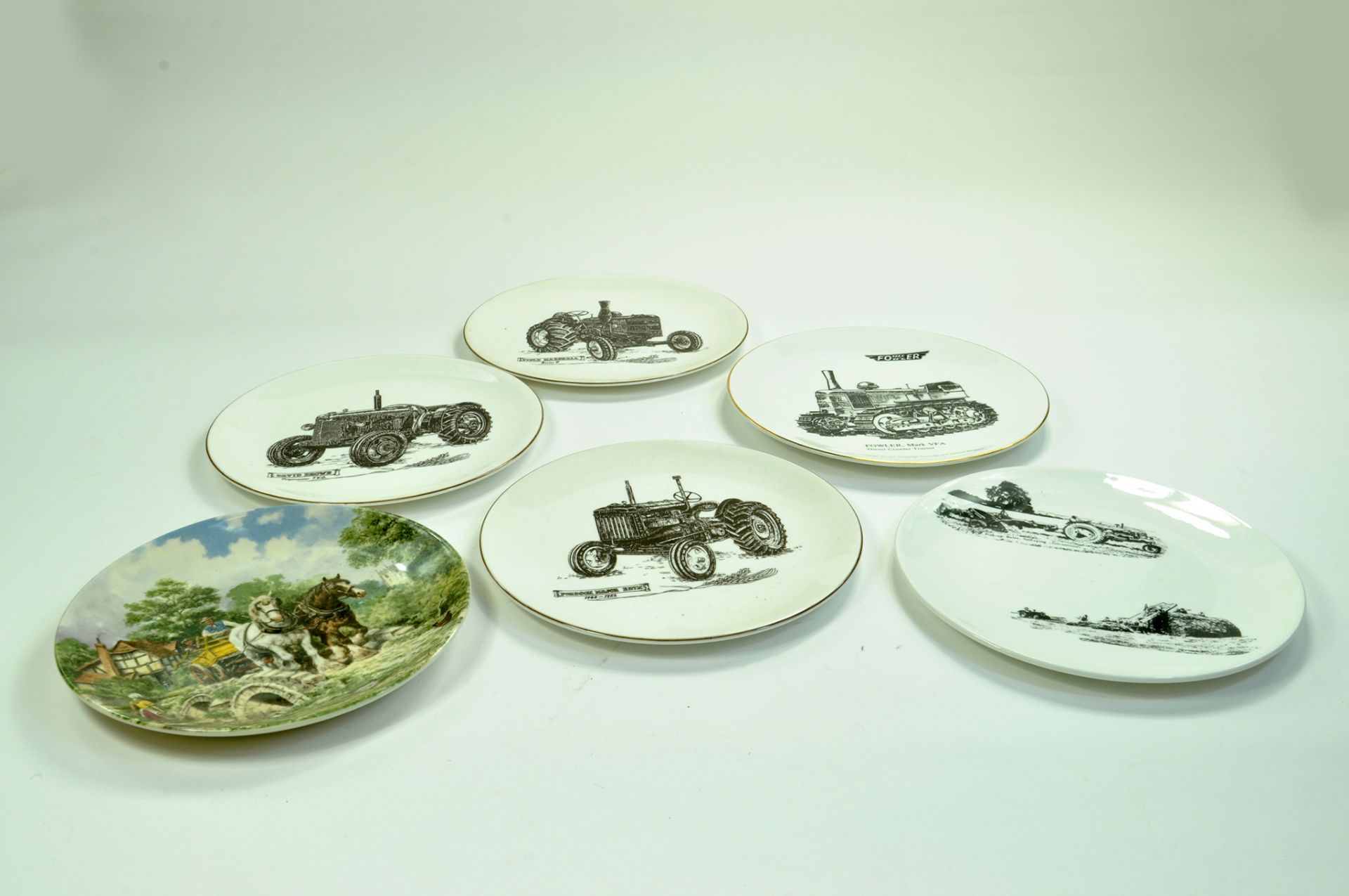 Various tractor themed ceramic plates. Enhanced Condition Reports: We are more than happy to provide