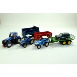 A 1/32 Ford and New Holland Tractor Trio comprising Britains and Siku issues with Trailers. Includes