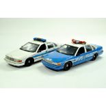 UT Models 1/18 diecast American Police Patrol Cars x 2 comprising Chicago and NYPD issues. Generally