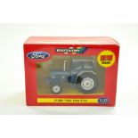 Britains 1/32 Farm issue comprising Ford 7000 Tractor. Excellent and secured within original box.
