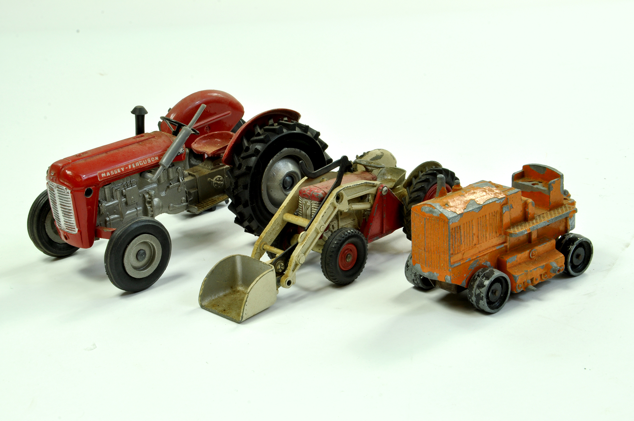 Trio of interesting older issue farm related items comprising Milton Massey Ferguson 35 Tractor,