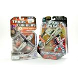 Duo of Star Wars Transformer Carded issues. Unopened. Excellent. Enhanced Condition Reports: We
