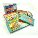 A group of vintage games including Magic Robot plus Junior Quiz, and others. Not verified complete