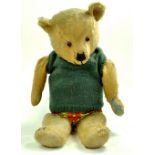 A well loved vintage bear issue, no labelling or markings. Maintains a reasonable condition with