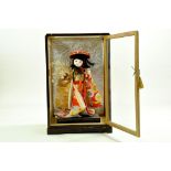 An impressive Vintage Geisha Doll Figure, mounted within a Cabinet Piece. Dressed in Silk, this