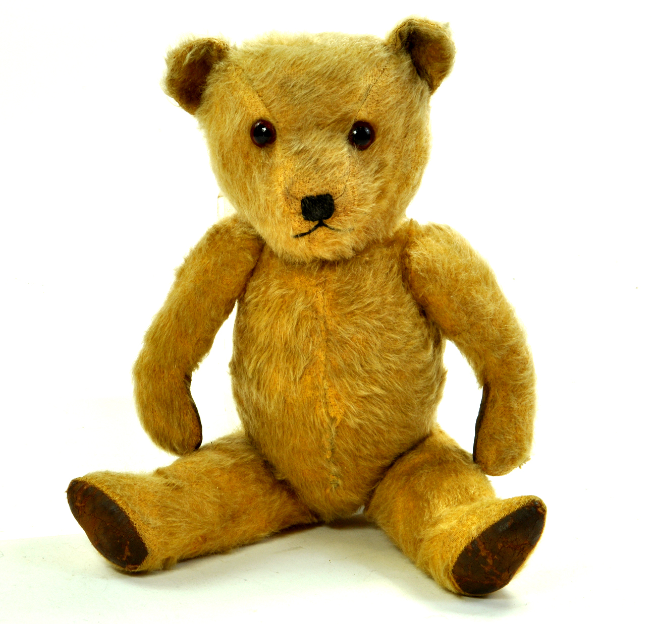 A handsome vintage bear with plenty of age wear but still charismatic in appearance. Likely