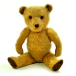 A handsome vintage bear with plenty of age wear but still charismatic in appearance. Likely