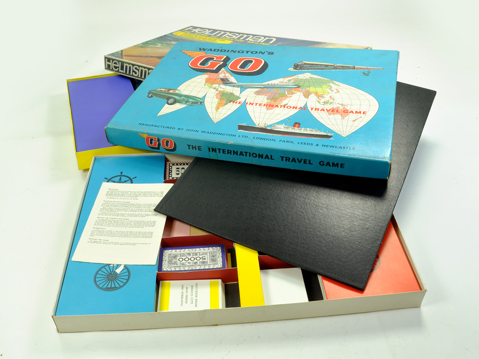 Duo of vintage games comprising Waddington's Go plus Helmsman. Both appear complete. Enhanced