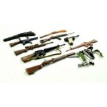 An assortment of Action Man Weapons including various gun issues. Generally Good. Enhanced Condition