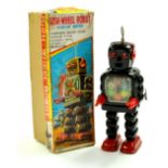 Vintage Yoshiya Japan, 10" Mechanical Operated High-Wheel Robot, with wind-up motor. Working example