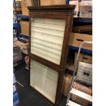 A large vintage wooden glass display cabinet. Supplied by S.A Nobbs, Lincoln. Some wear and tear.