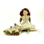 Impressive 17” Antique bisque head shoulder plate doll. Markings on back – unidentified. Face is