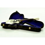 A miniature Guitar including Case. Generally very good to excellent. Enhanced Condition Reports: