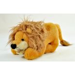 Straw filled Crouching Lion growling. 32cm long. Generally very good. Note: We are always happy to