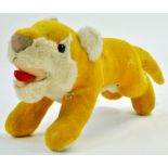 An interesting charging Lion with red tongue. 44cm nose to tail. Very Good. Note: We are always