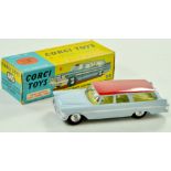 Corgi No. 445 Plymouth Sports Suburban Station Wagon. Issue is pale blue with red roof, lemon