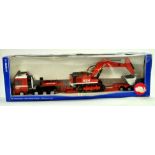 Siku 1/50 diecast truck issue comprising MAN low Loader with excavator load. Appears very good to