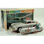 Durham Industries (USA) M101 Tinplate Battery Operated Aston Martin (DB5) Secret Ejector Car,