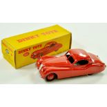Dinky No. 157 Jaguar XK120 Coupe. Issue has red body and ridged hubs with black smooth tyres and