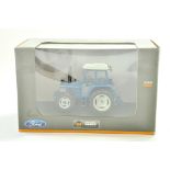 Universal Hobbies 1/32 Farm issue comprising Ford 6610 4WD Tractor. Excellent and secured in box.