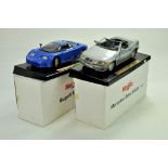 Duo of 1/18 Maisto diecast cars, Bugatti and Mercedes. Appear very good with boxes. Note: We are